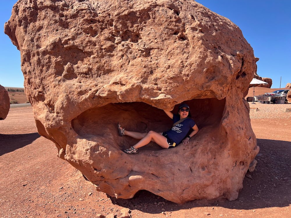Lisette being eaten by a boulder