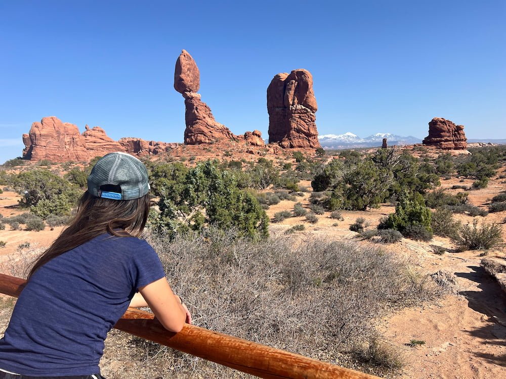 Lisette wondering if that rock will fall