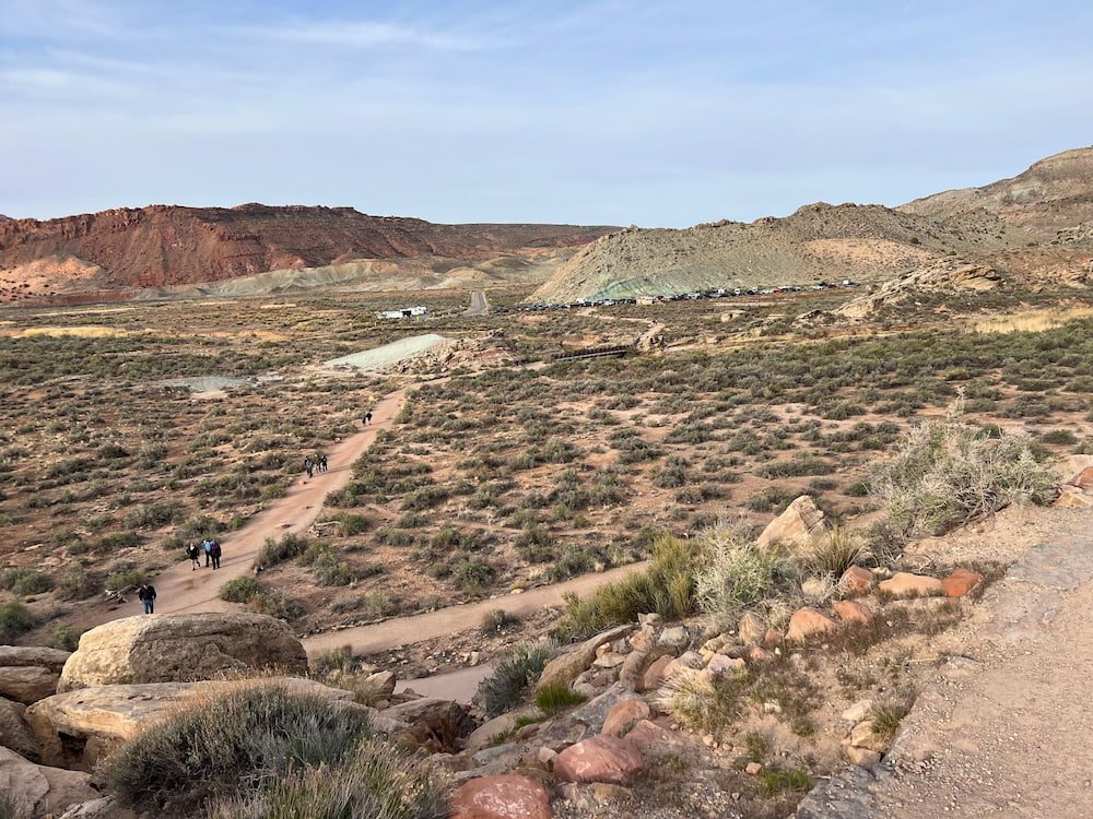 Looking back at our parking spot among the green hills