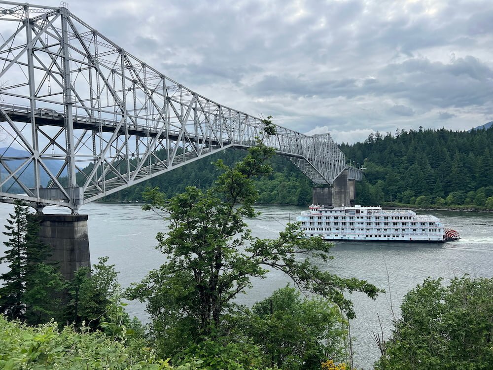 A paddle wheeler going under the Bridge of the Gods