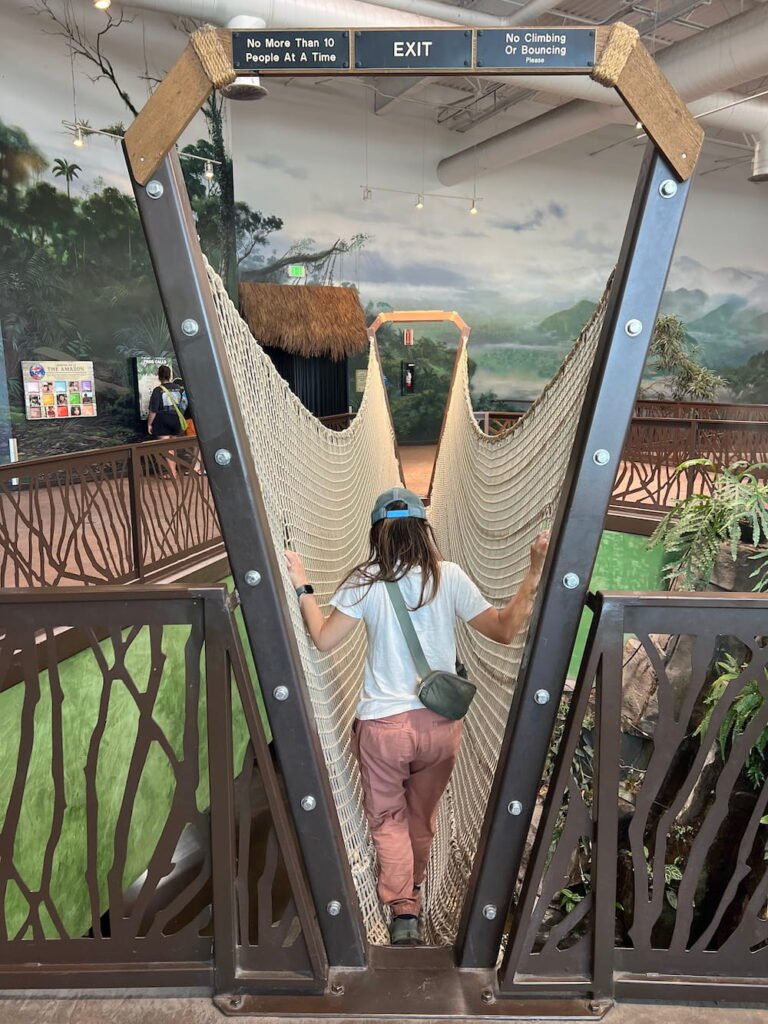 Lisette crossing the rope bridge