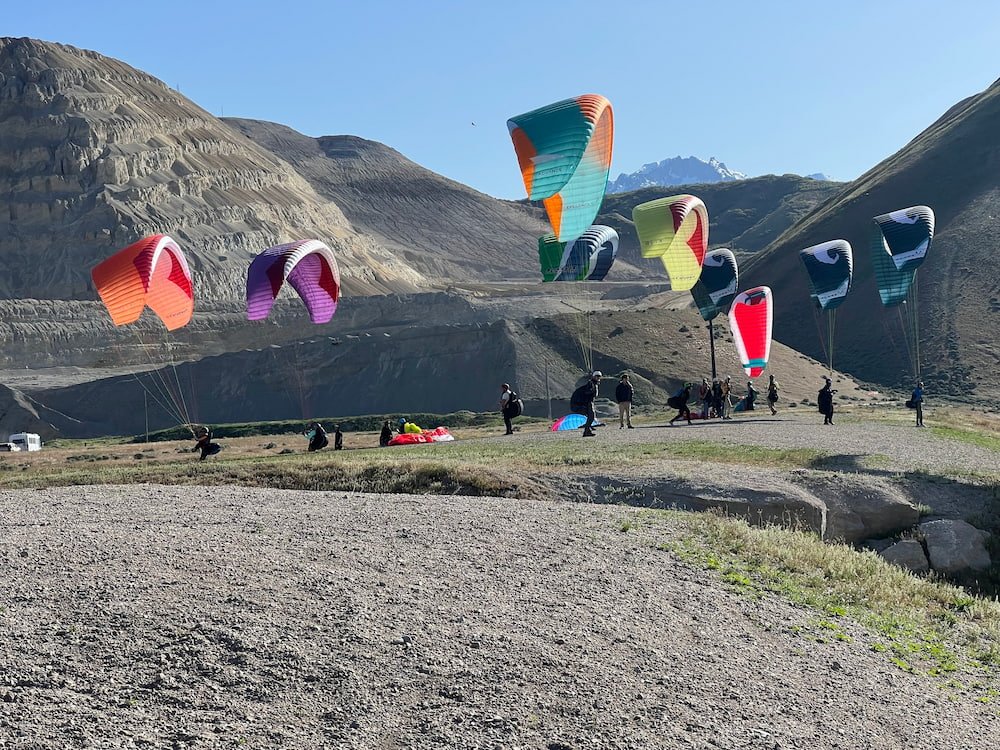 Paragliders waiting to launch