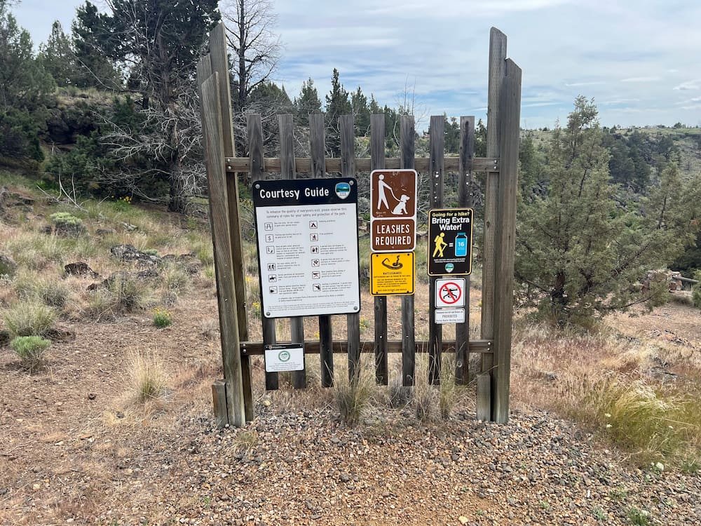 Warning signs at the start of the hike
