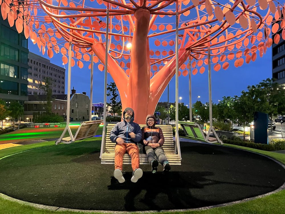 Having too much fun swinging in the rain at the Gentle Breeze art installation