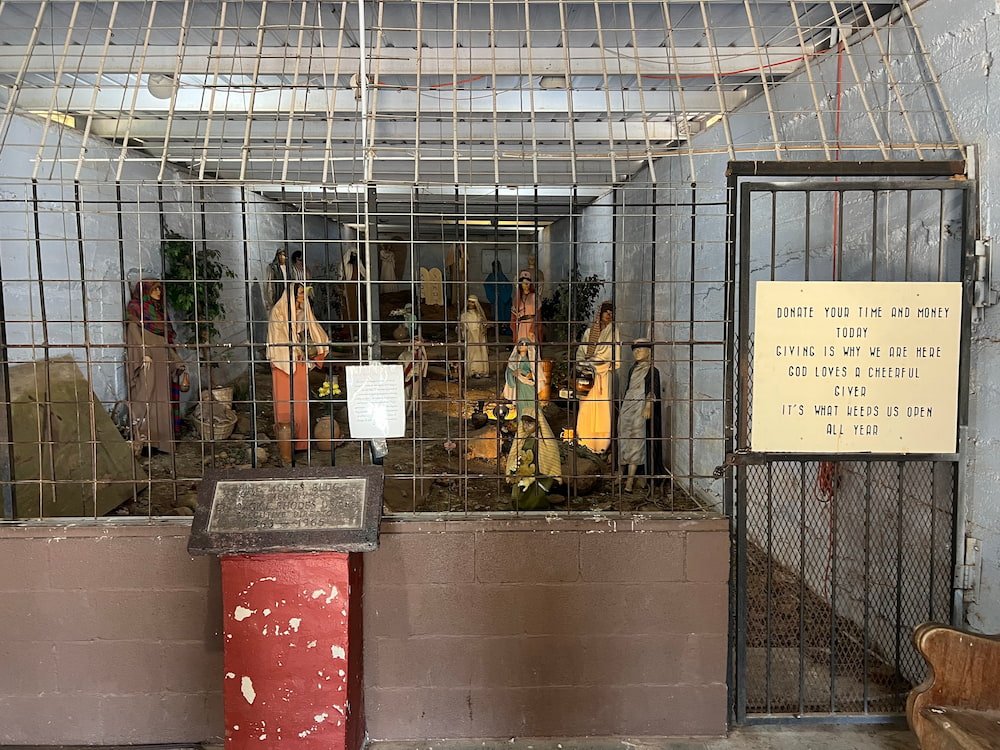Creepy caged in Nativity Scene