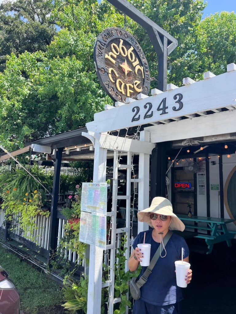 Lisette looking hot with our smoothies at the Hobbit Cafe