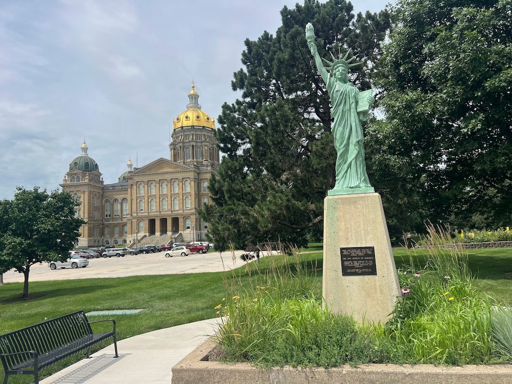 Miniature Statue of Liberty in front of the Capitol Building