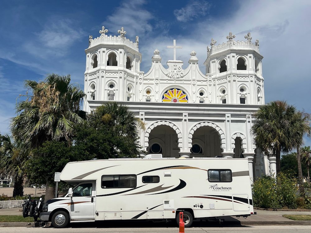 Parked in front of the Sacred Heart Church