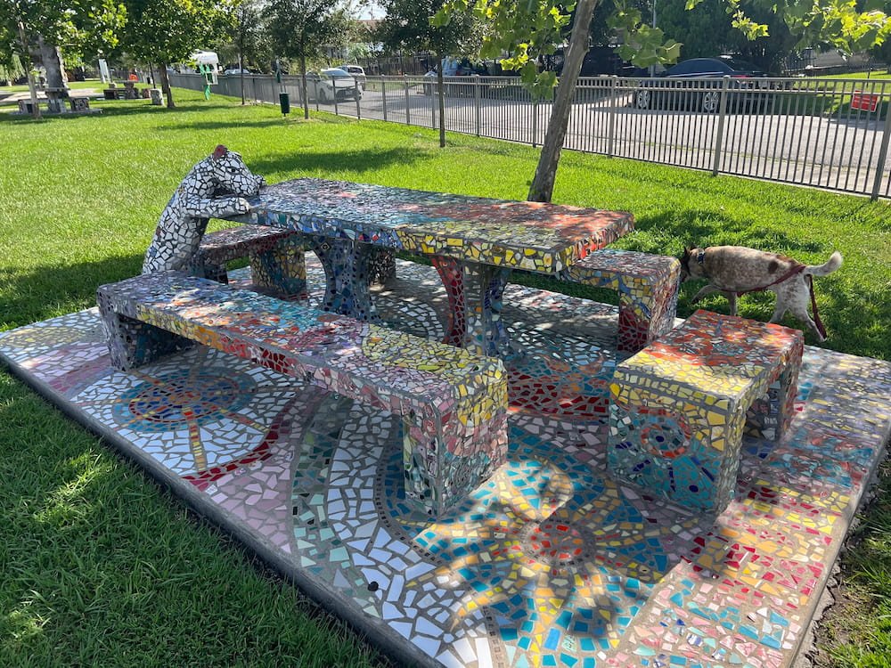 Sheila playing hide and seek with the mosaic dog