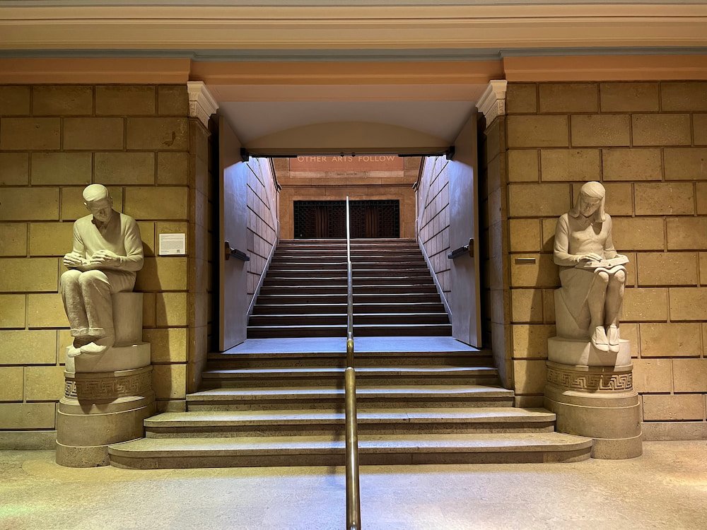 Statues of students studying in the University