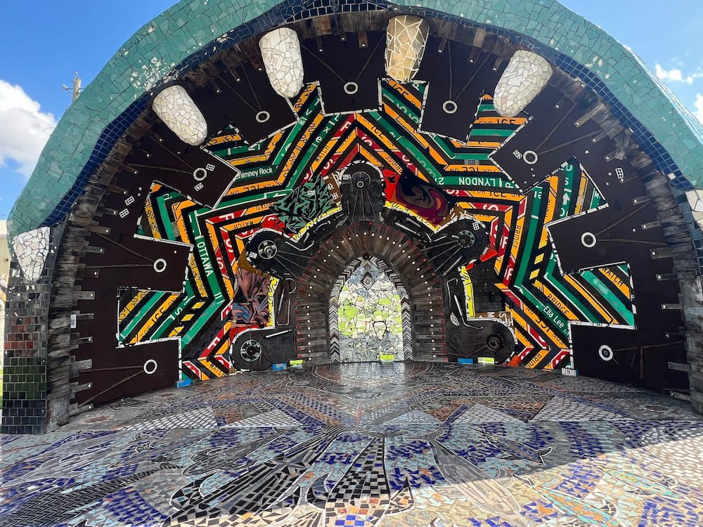 Tiles and pieces of mirror along with many other objects