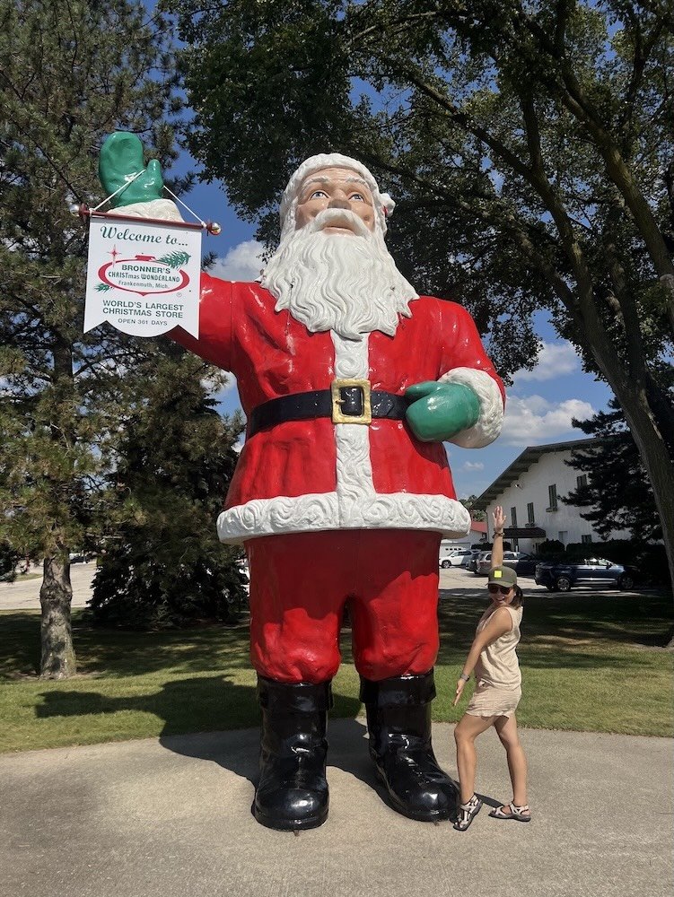 Lisette and a giant Santa