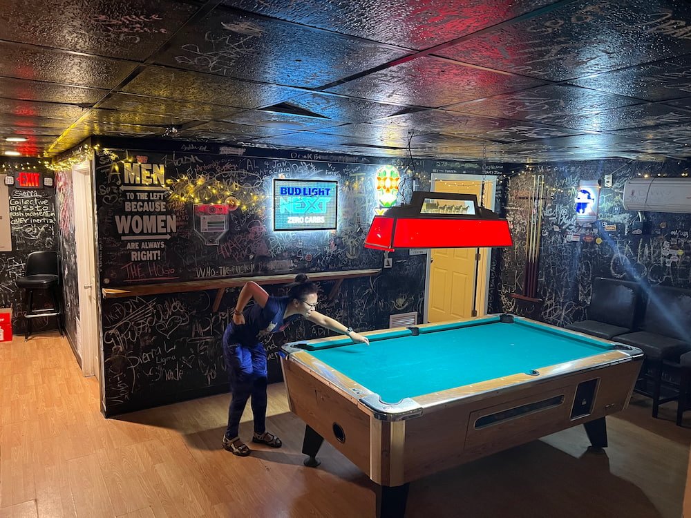 Lisette playing invisible pool