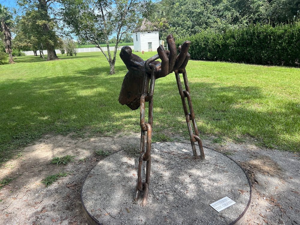 Returning the chains sculpture