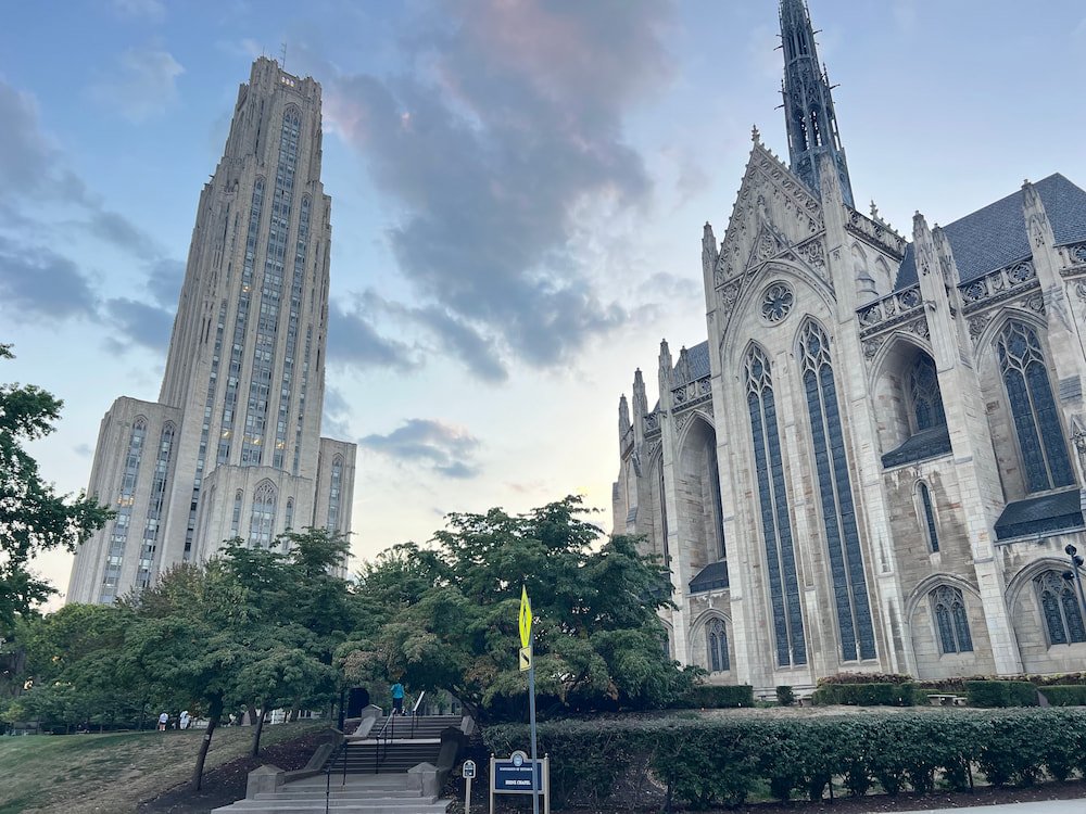 Cathedral of Learning and a church