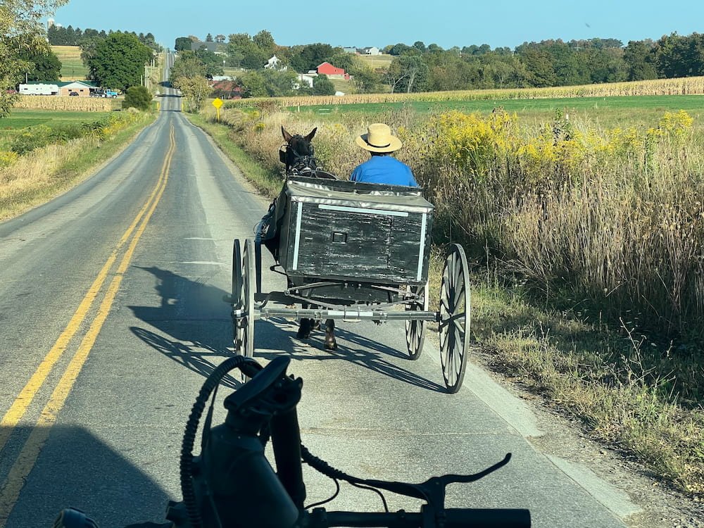 Driving behind a horse and buggy