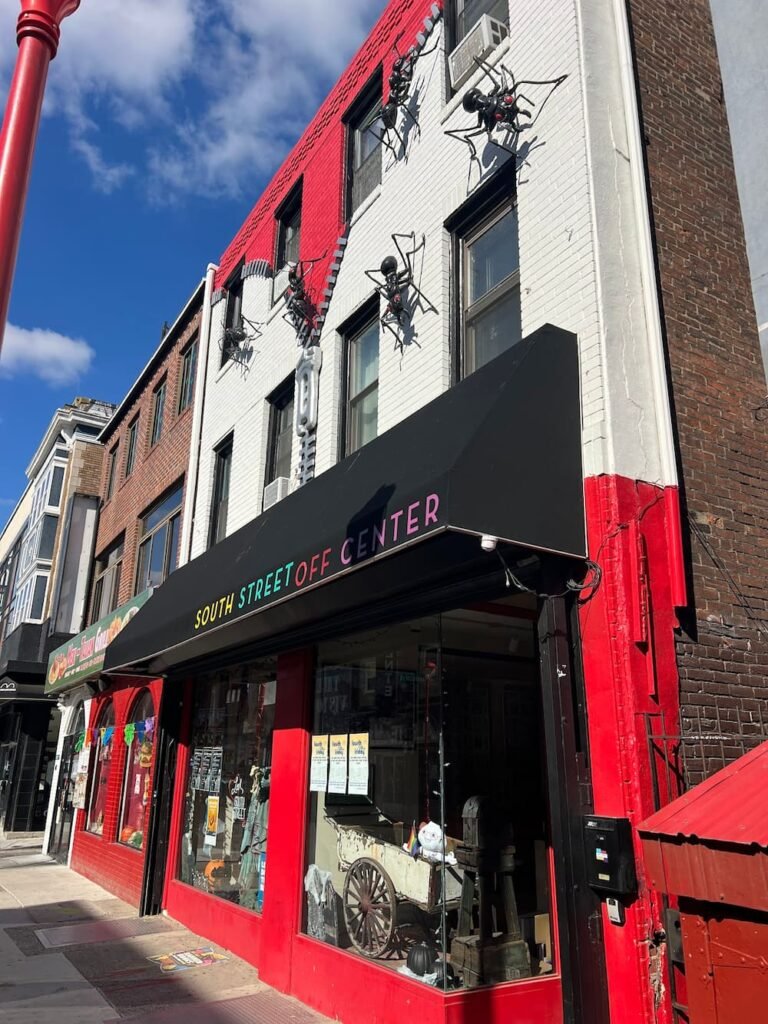 Giant ants sculpture on the side of this building