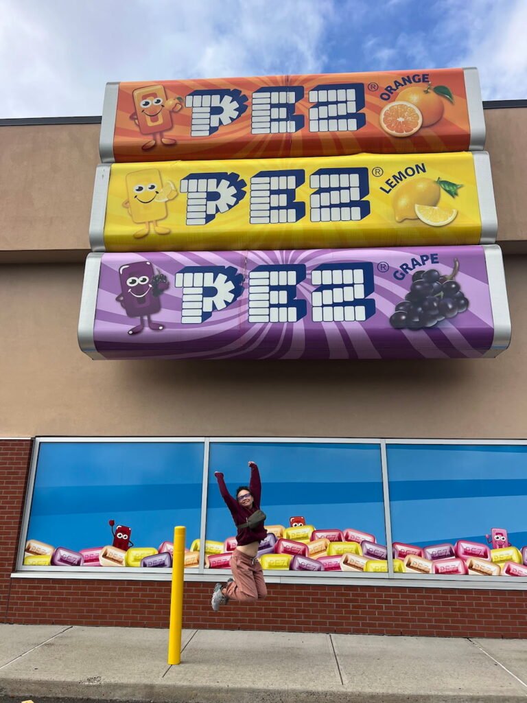 Lisette jumps for joy at the PEZ Museum