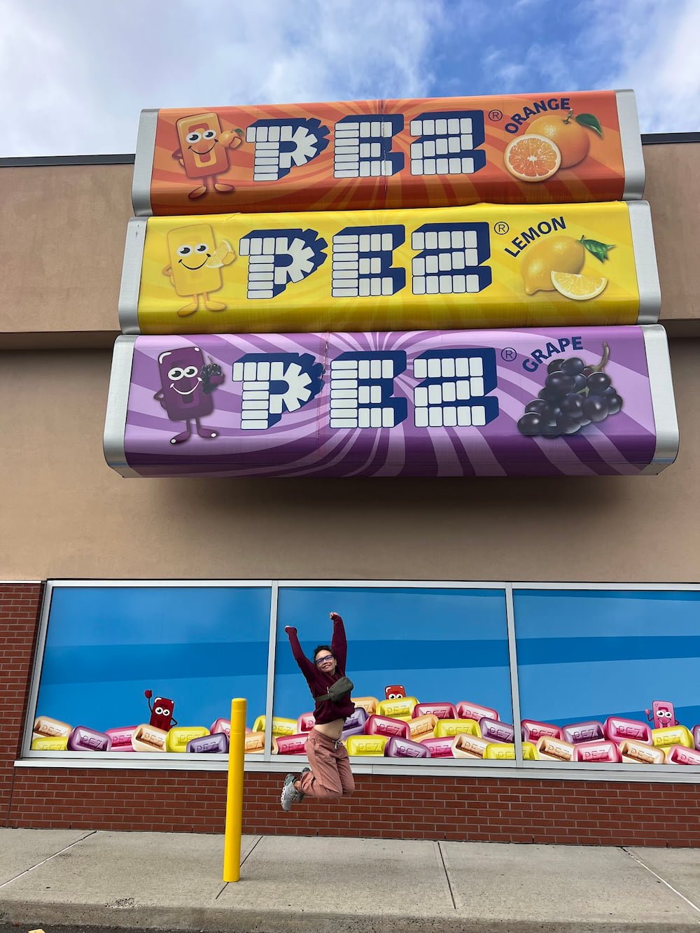 Lisette jumps for joy at the PEZ Museum