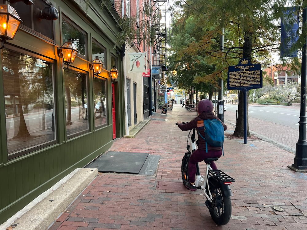 Lisette riding on the footpath tsk tsk