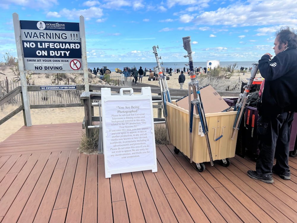 Sign for filming at the beach