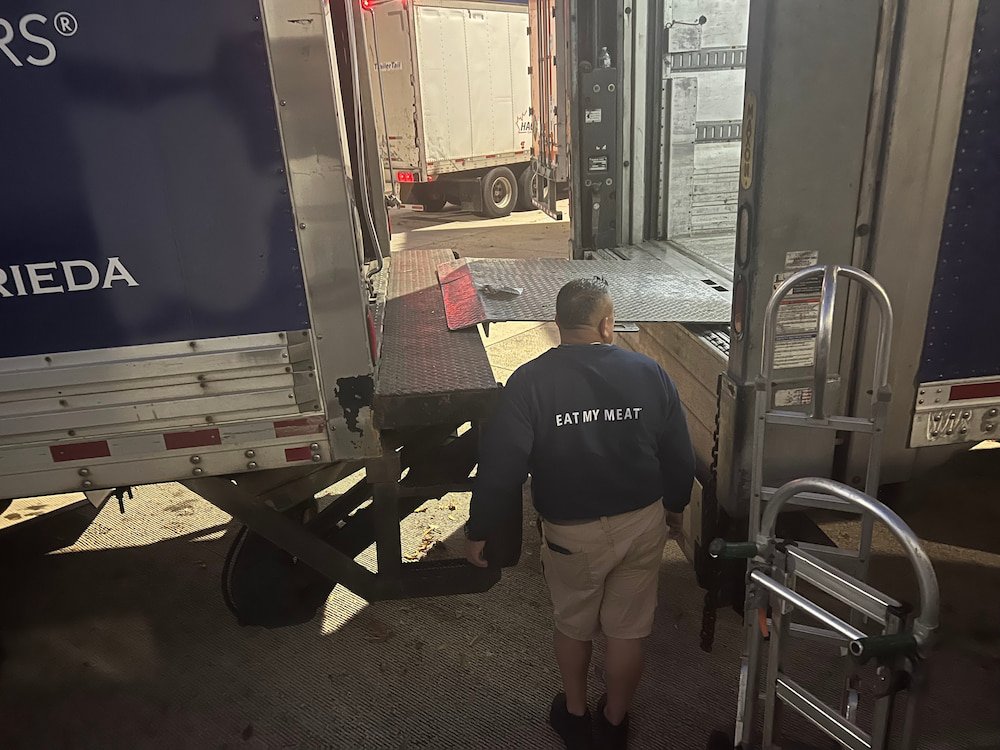 The two trucks transfering goods