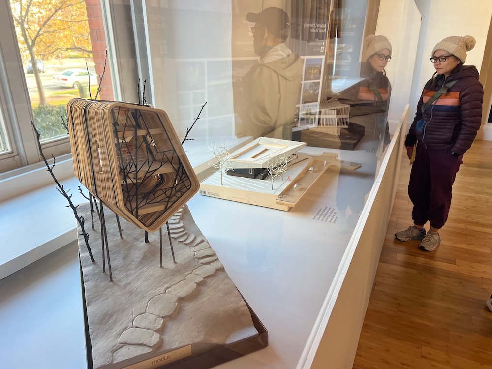 Lisette checking out the models