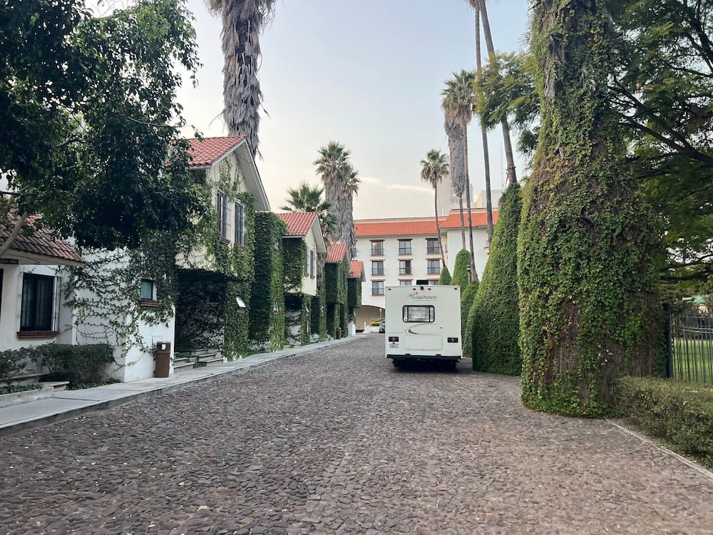 Parked on cobblestones at the Hotel Flamingo Inn