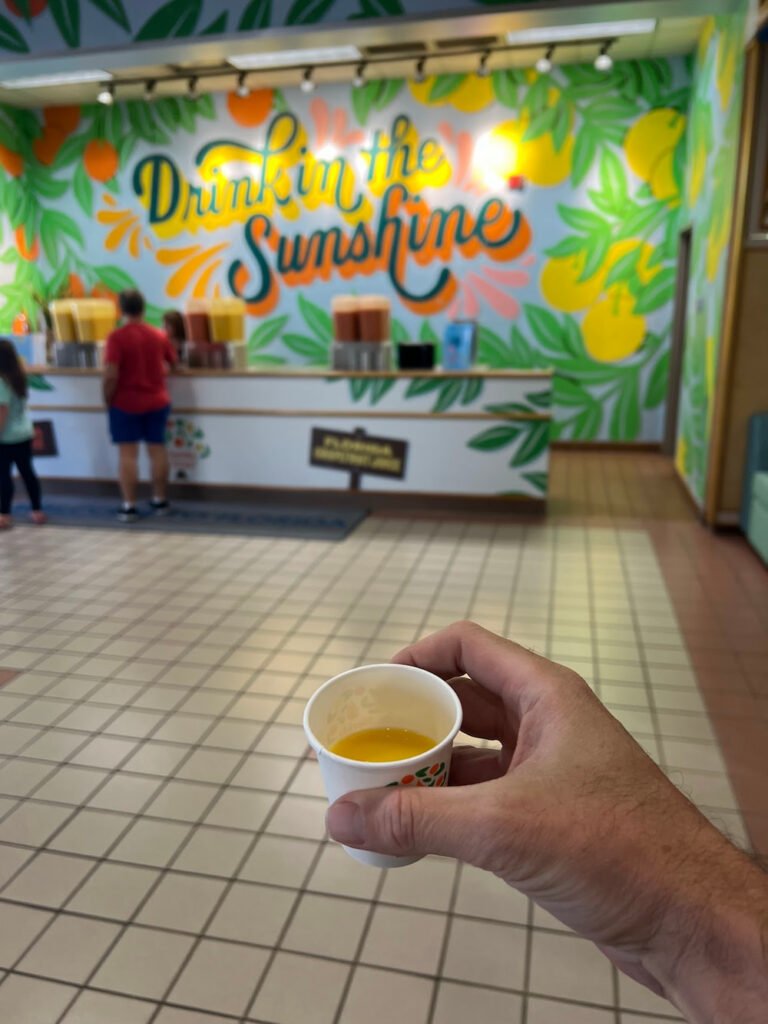 Trying the orange and grapefruit sample drinks